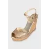 Gold high wedge sandals
