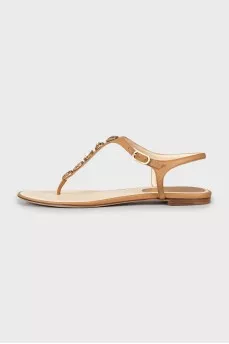 Leather sandals with gold decoration