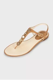 Leather sandals with gold decoration