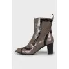 Two-tone perforated ankle boots