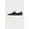 Leather slip-ons with white soles