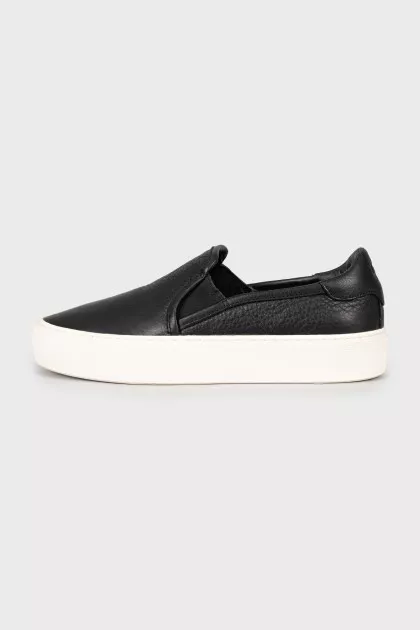 Leather slip-ons with white soles