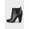 Ankle boots decorated with metal rhinestones