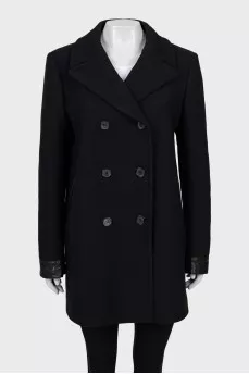 Wool coat with leather inserts