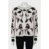 Black and white sweater with tag