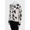 Black and white sweater with tag