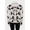 Black and white sweater with tag