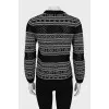 Sweater with perforation and pattern