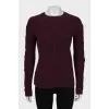 Knitted sweater with decor on the sleeves