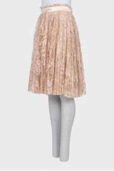 Pleated beige skirt with lace