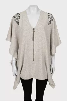 Cashmere cape decorated with rhinestones