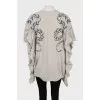 Cashmere cape decorated with rhinestones