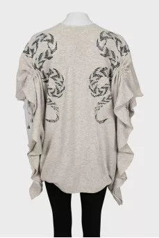 Cashmere cape decorated with rhinestones