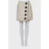 Tweed skirt decorated with flowers