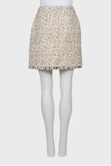 Tweed skirt decorated with flowers