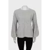 Knitted gray sweater decorated with rhinestones