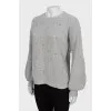 Knitted gray sweater decorated with rhinestones