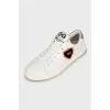 White leather sneakers with patch