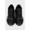 Black leather sneakers
