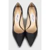 Black snakeskin embossed pumps