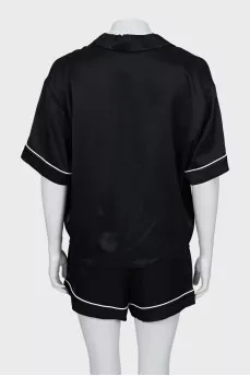 Black suit with shorts and tag