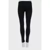 Black leggings with leather stripes