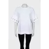 Oversized T-shirt with decor on the sleeves