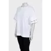 Oversized T-shirt with decor on the sleeves