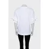 Oversized T-shirt with decor on the sleeves
