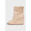 Open toe wedge boots