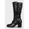 Leather boots decorated with buckles