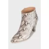 Animal print ankle boots with embossing