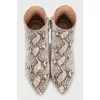 Animal print ankle boots with embossing