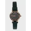 Green watch with tag