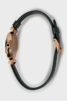 Green watch with tag