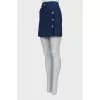 Blue skirt with gold buttons