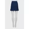 Blue skirt with gold buttons