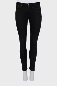 High-waisted black skinny jeans