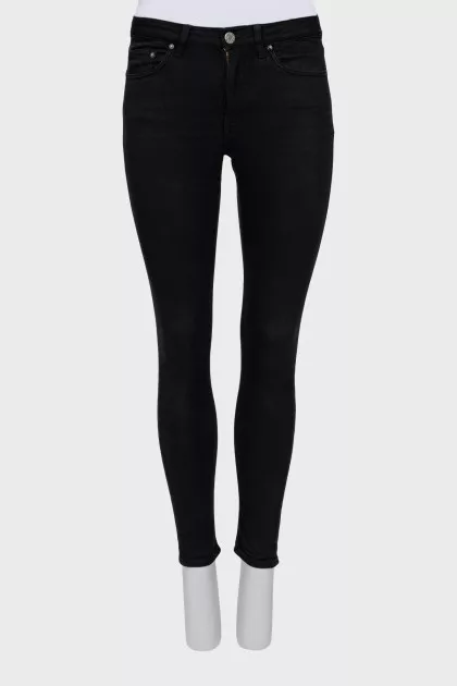 High-waisted black skinny jeans
