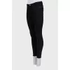 High-waisted black skinny jeans