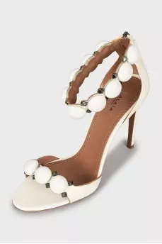 Lacquered sandals with decor