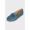 Leather loafers decorated with bow