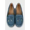 Leather loafers decorated with bow