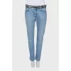 Light blue jeans with belt