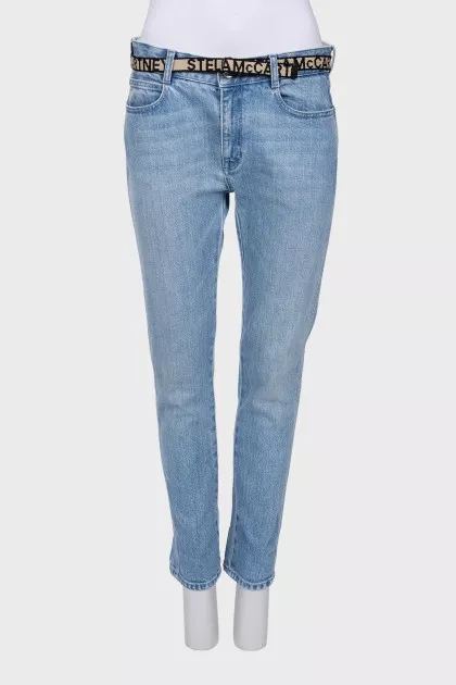Light blue jeans with belt