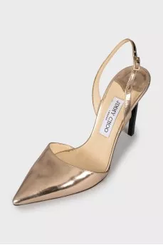 Gold pointed toe shoes
