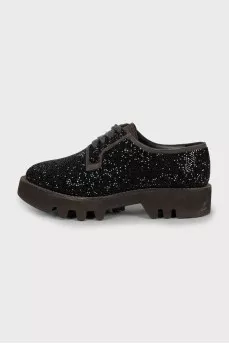 Lace-up shoes decorated with rhinestones