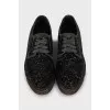 Lace-up shoes decorated with rhinestones