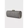Shiny clutch with gold hardware