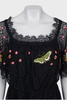 Lace dress decorated with embroidery